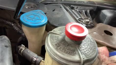 i used a turkey baster to suck out all the old fluid, then filled it back with new fluid and turned the steering wheel lock to lock few times. . Honda odyssey power steering fluid